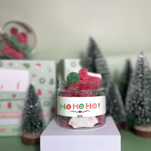 Jar of dairy and gluten free sweets with HO HO HO banner on the front