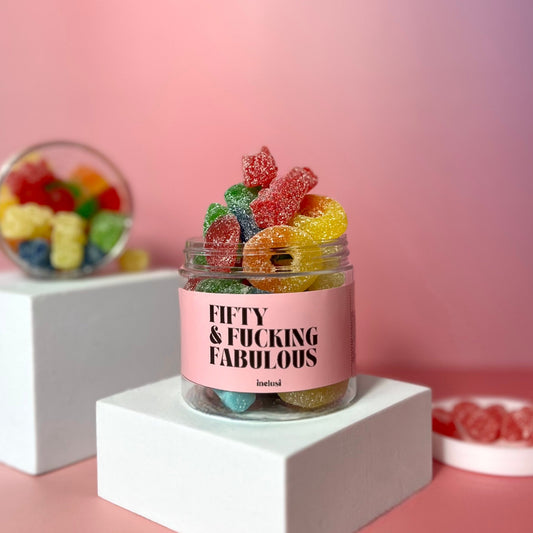 Jar of gummy bear sweets for pink themed 50th birthday