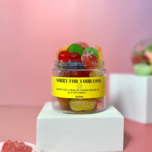 Jar of colourful vegan gluten free sweets with funny leaving gift