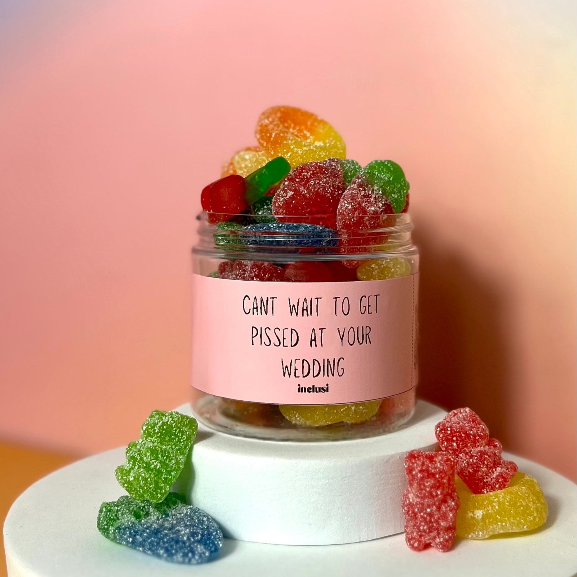Jar of colourful vegan and gluten free sweets to celebrate an engagement