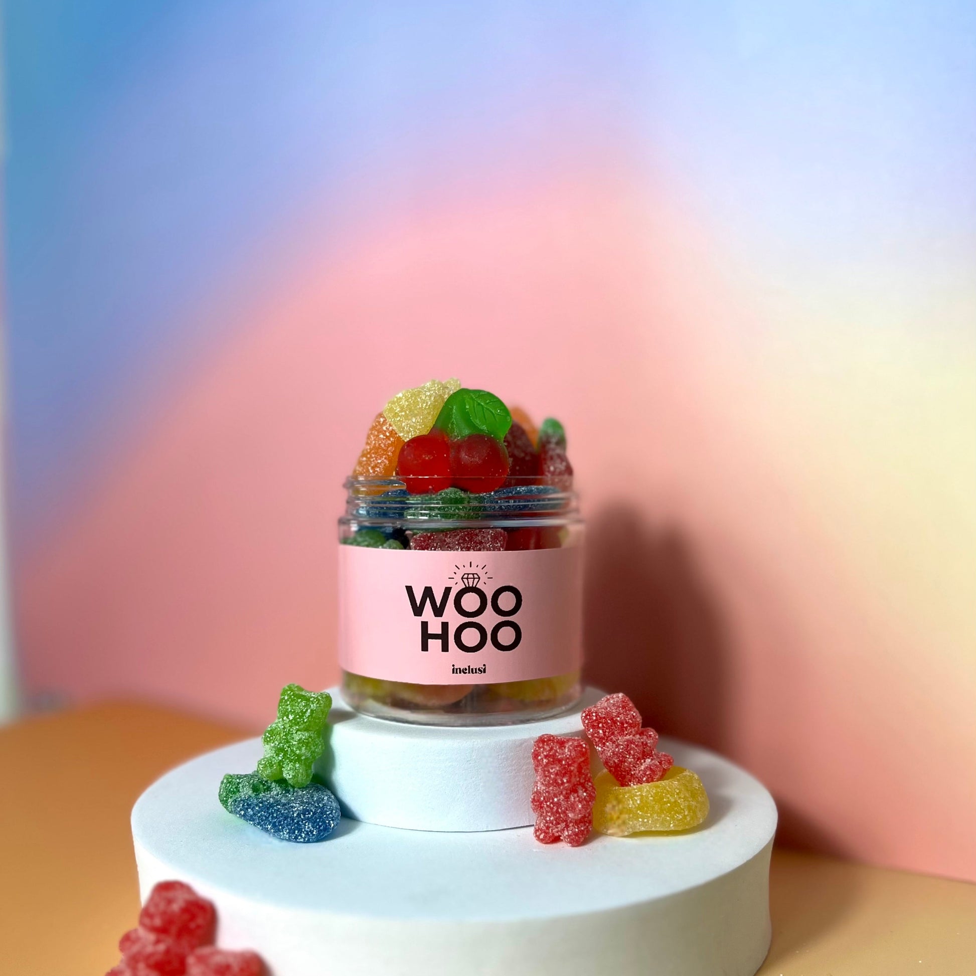 Jar of colourful vegan and gluten free sweets celebrating an engagement gift