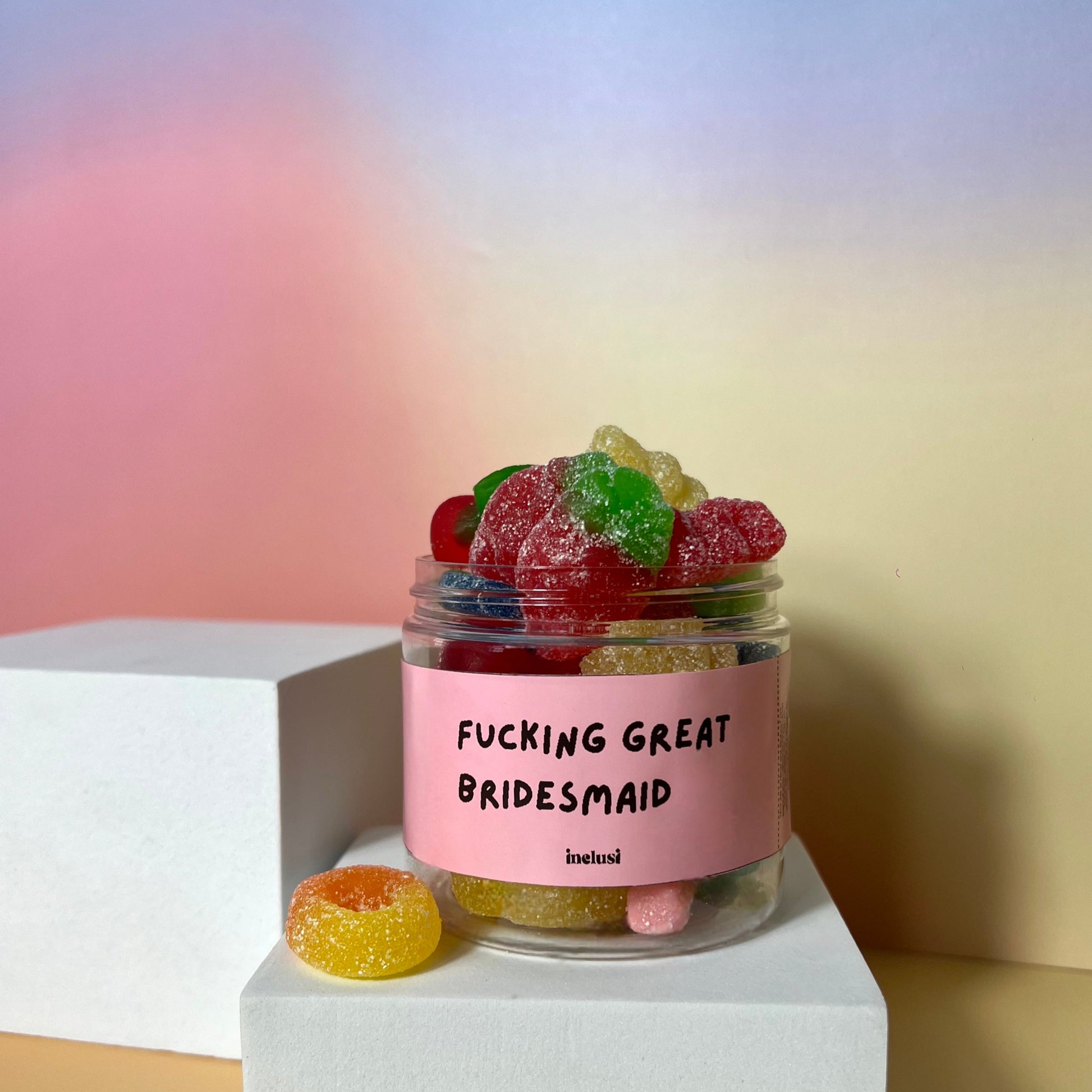 Jar of colourful vegan and gluten free sweets gift to thank your bridesmaids