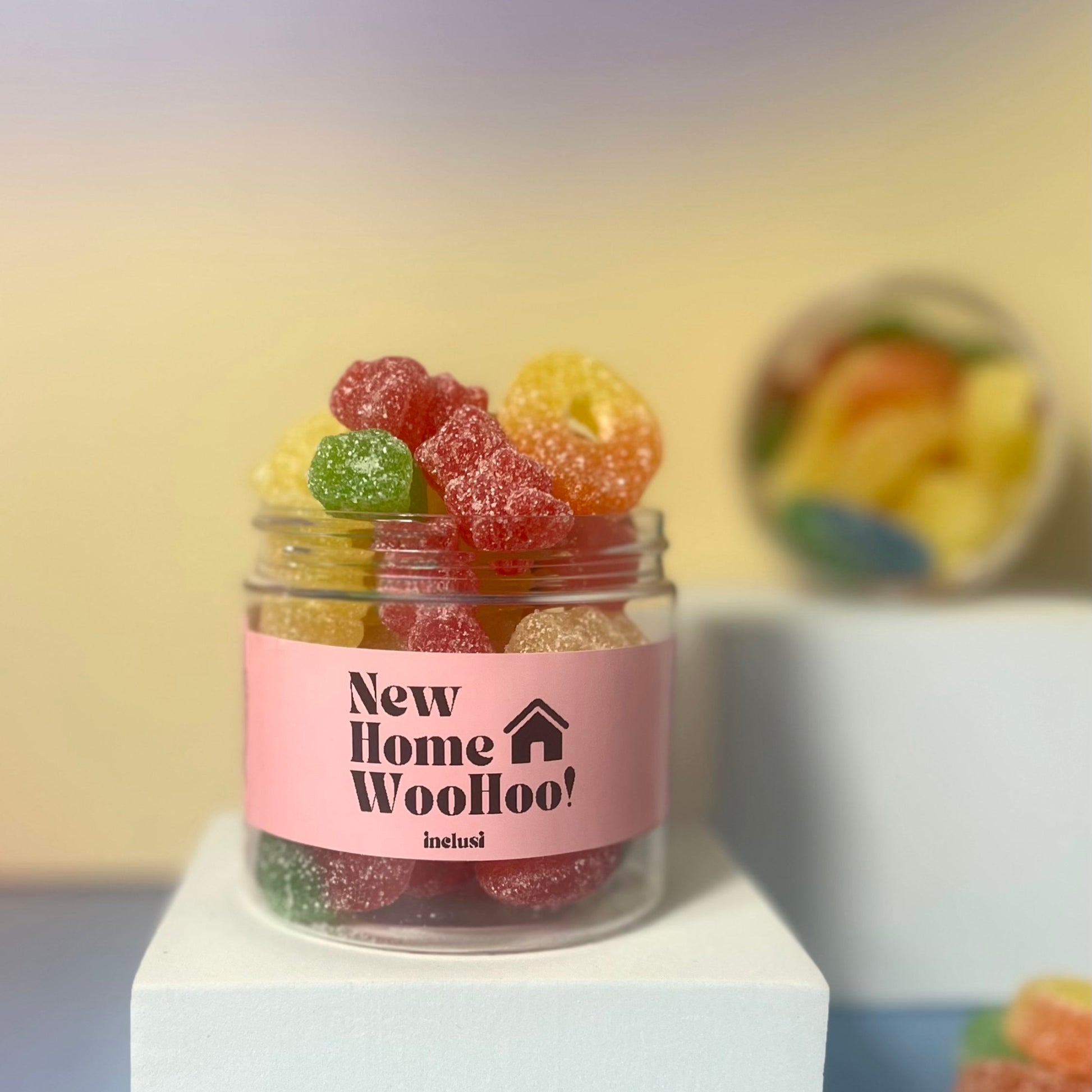 Jar of colourful vegan gluten free sweets to celebrate a new home gift