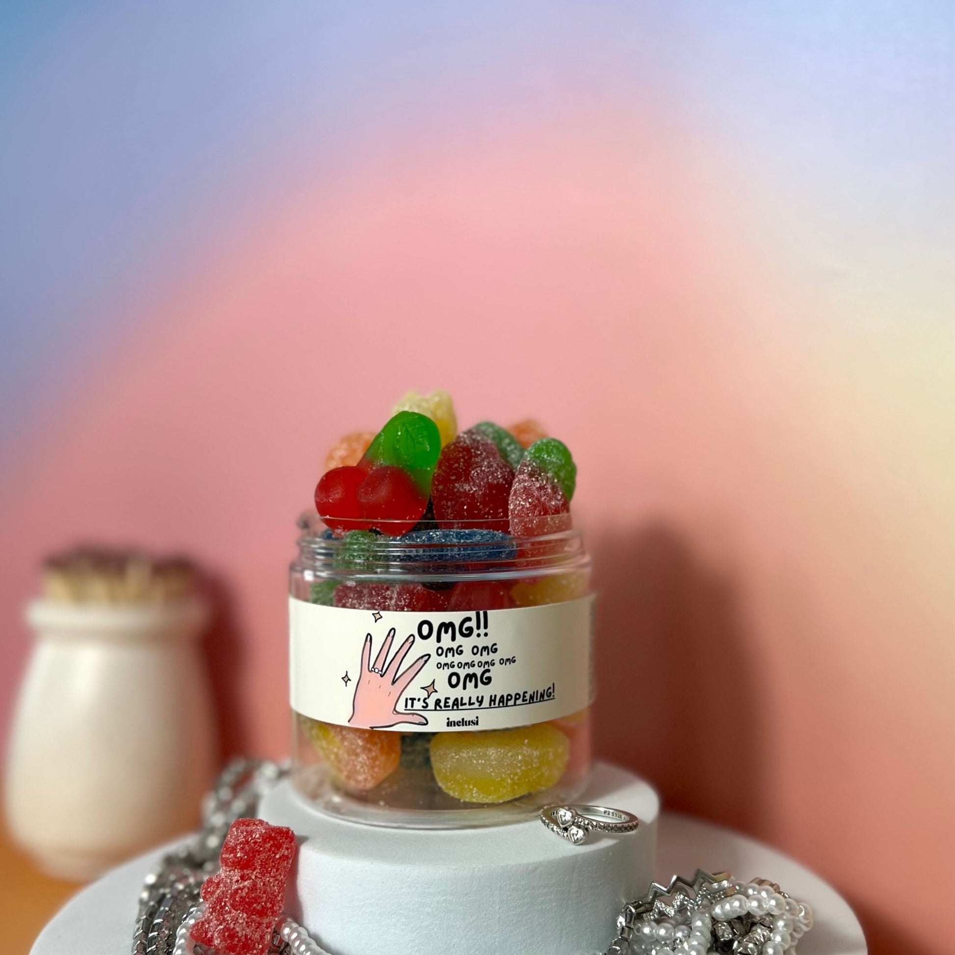 Jar of colourful gluten free and vegan sweets to celebrate an engagement
