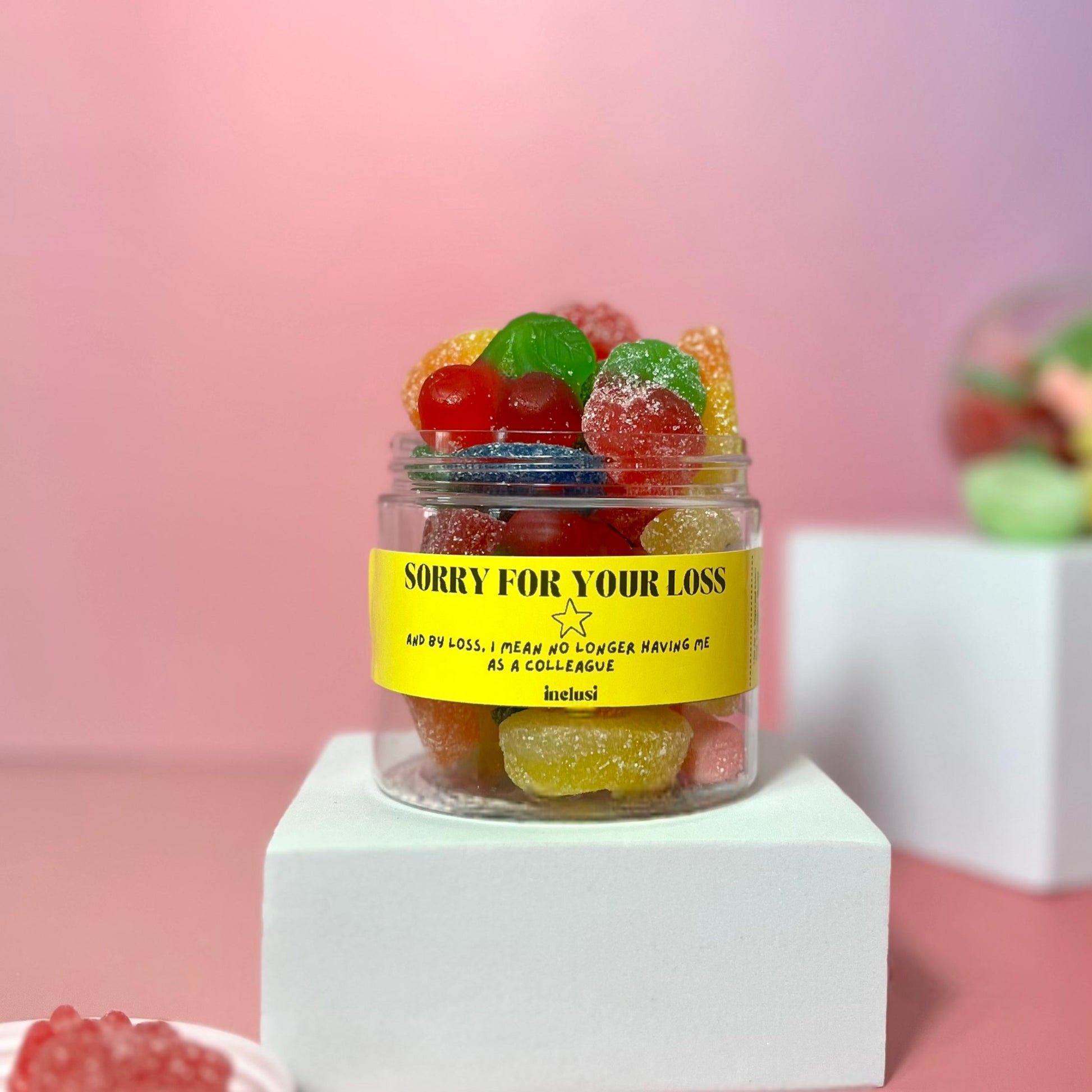 Jar of colourful vegan gluten free sweets with funny leaving gift
